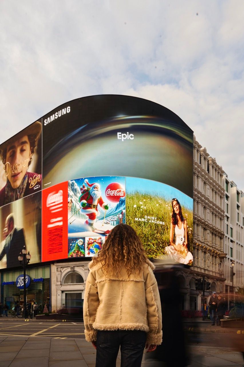 girl looking at billboard