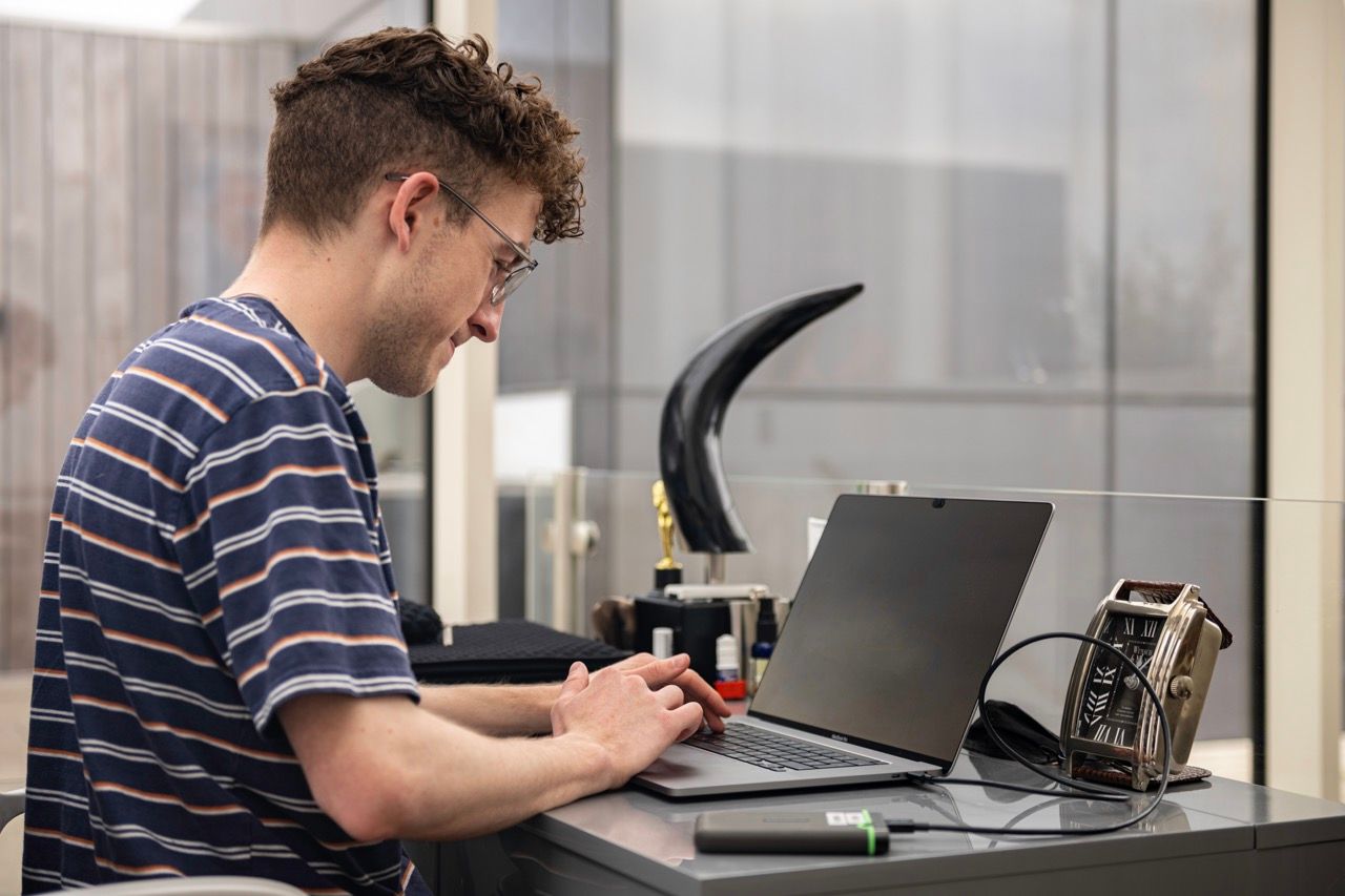 image of man working on laptop